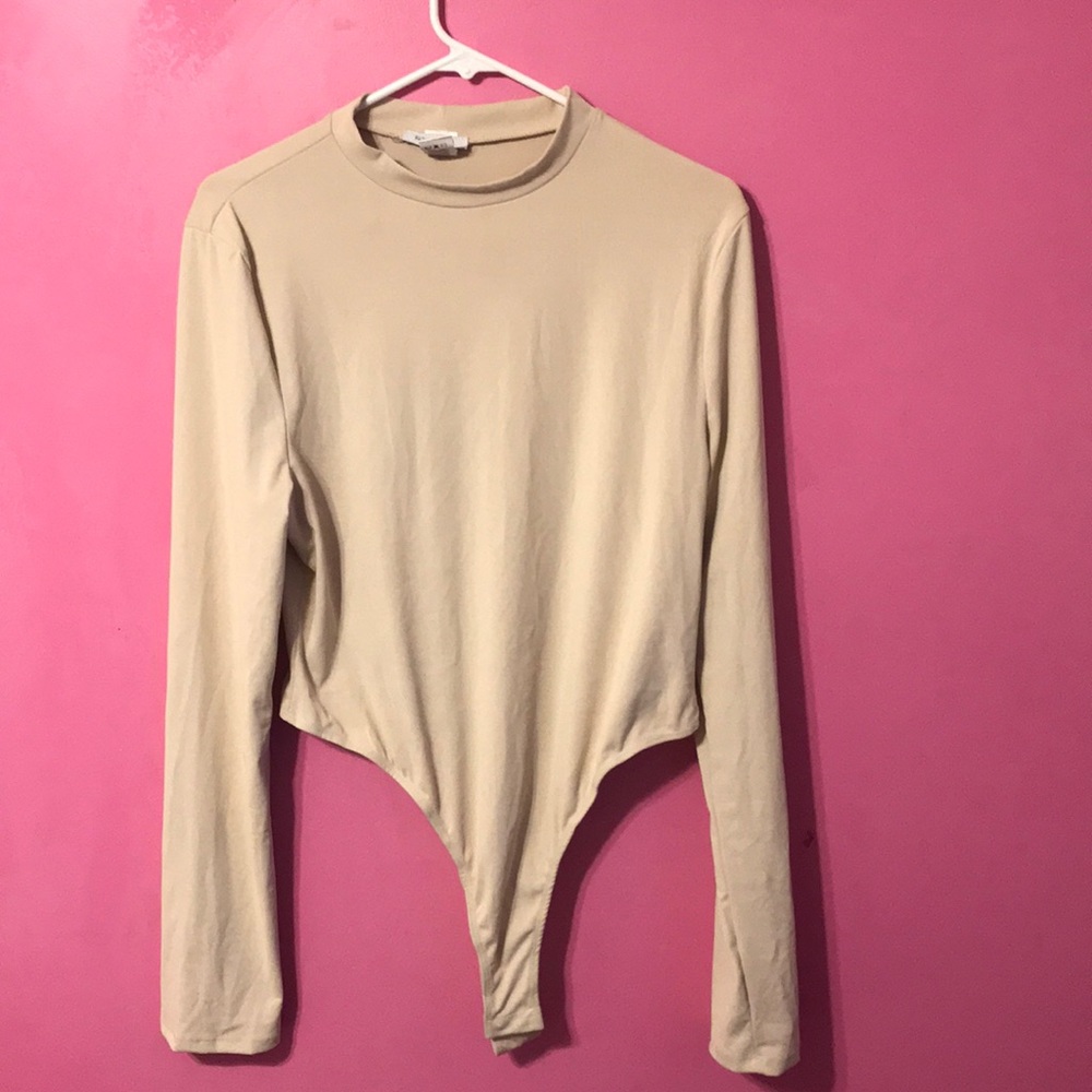 Light tan body suit